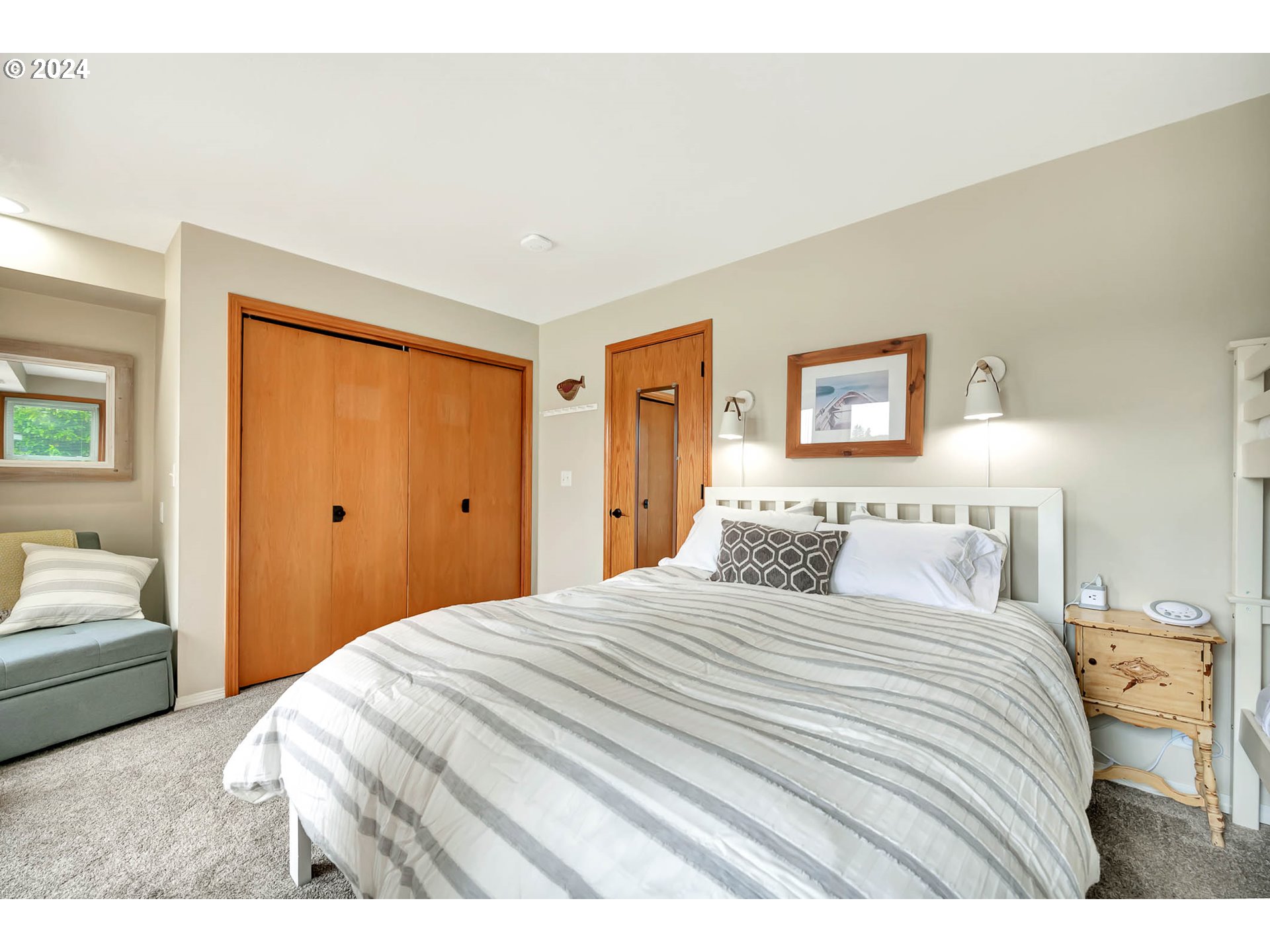 5378 Buckskin Bob Road Florence, OR 97439 - Photo 24 of 46 a bedroom with a bed and a view of bedroom