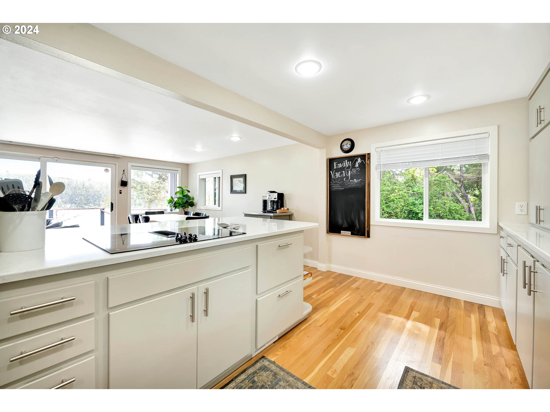 5378 Buckskin Bob Road Florence, OR 97439 - Photo 7 of 46 a bathroom with a sink a mirror and a window