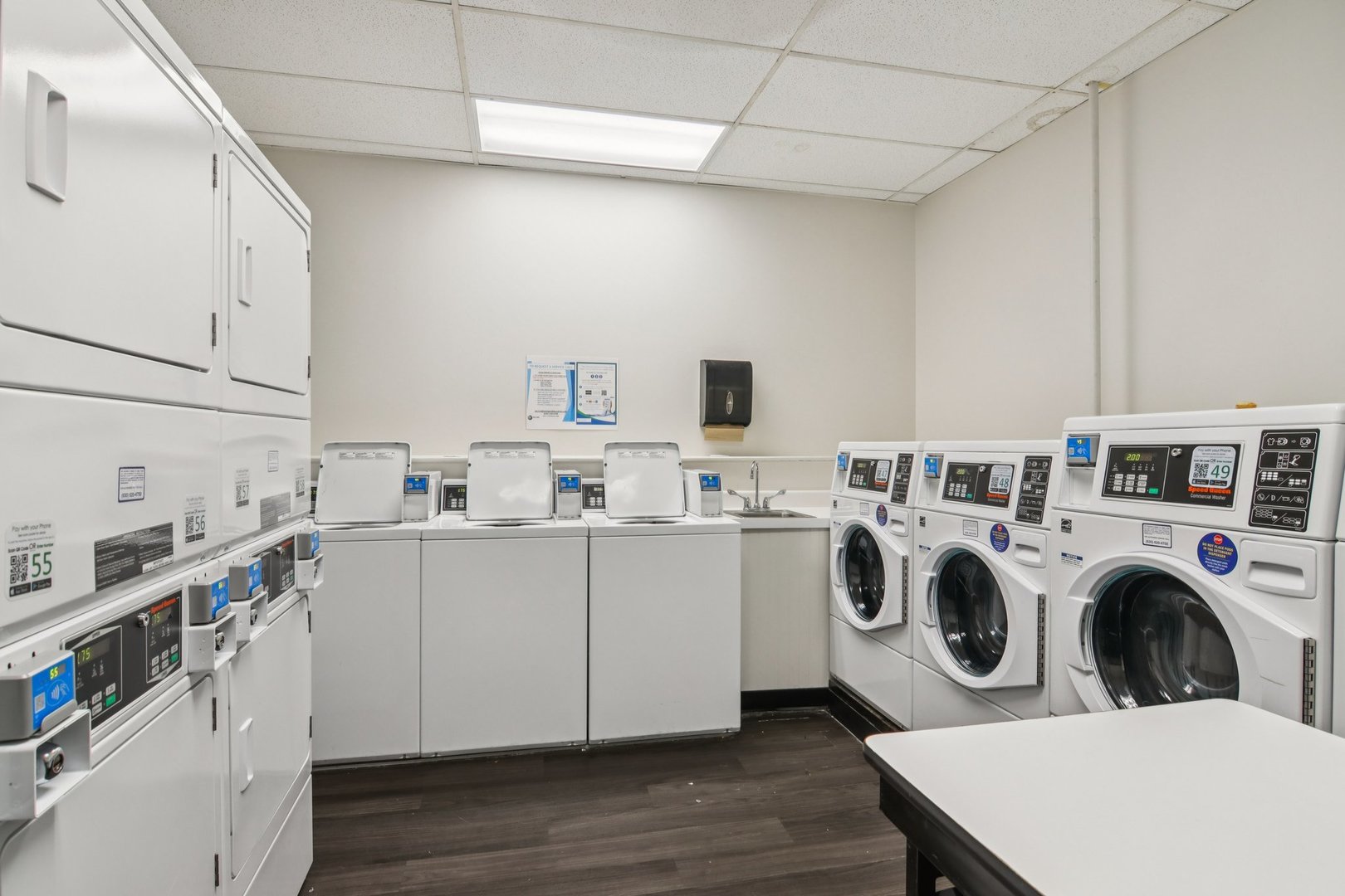 780 South Federal Street, Unit 902 Chicago, IL 60605 - Photo 25 of 28 a utility room with sink dryer and washer