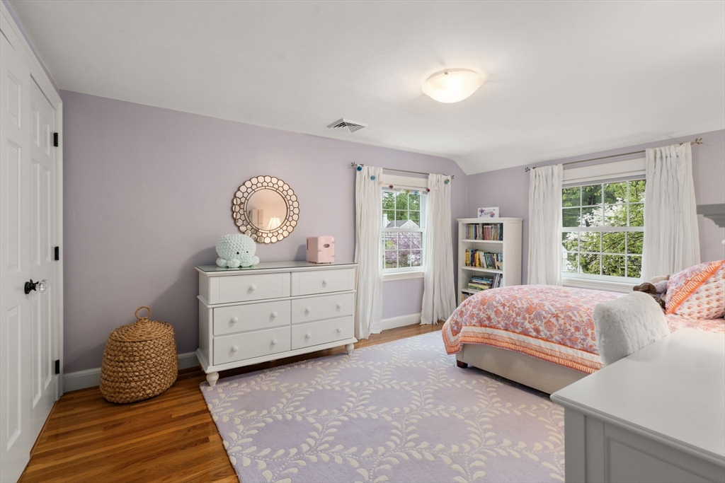 9 Lafayette Circle Wellesley, MA 02482 - Photo 26 of 35 a bedroom with a bed and window