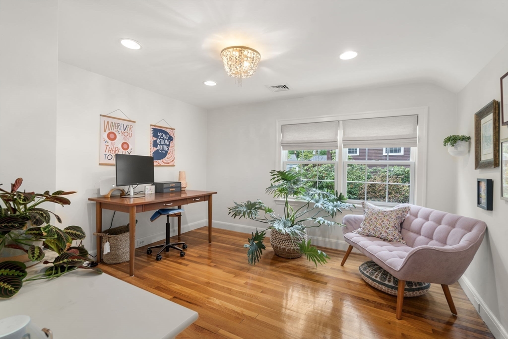 9 Lafayette Circle Wellesley, MA 02482 - Photo 28 of 35 a living room with furniture and a large window