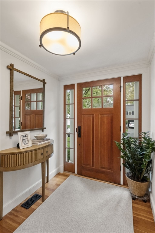 9 Lafayette Circle Wellesley, MA 02482 - Photo 4 of 35 wooden floor chandelier and window in a room