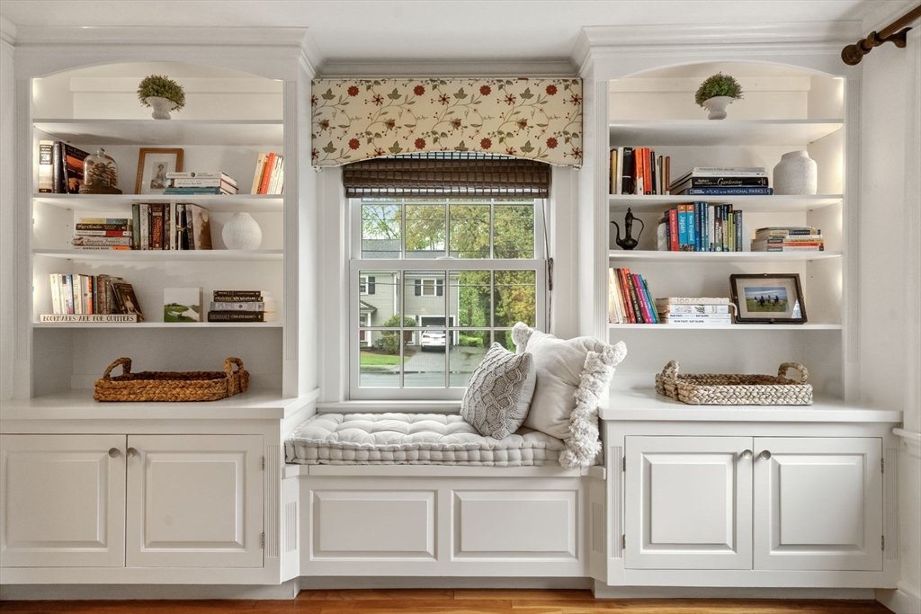 9 Lafayette Circle Wellesley, MA 02482 - Photo 8 of 35 a room with a book shelf and a window