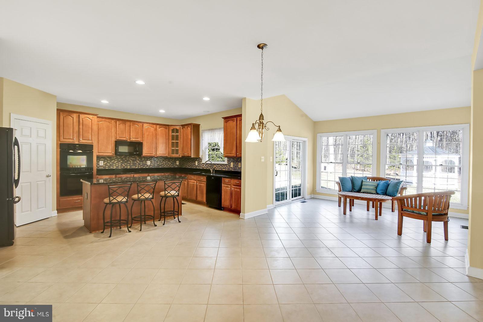 1714 Perry Cove Road Pasadena, MD 21122 - Photo 9 of 45 view of Kitchen and Sun Room
