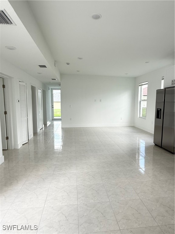 1015 Jaguar Boulevard Lehigh Acres, FL 33974 - Photo 6 of 9 a view of livingroom with window