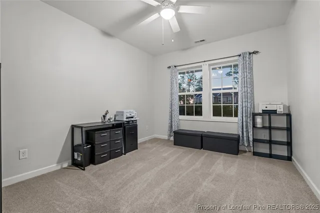 a room with a bed and a window