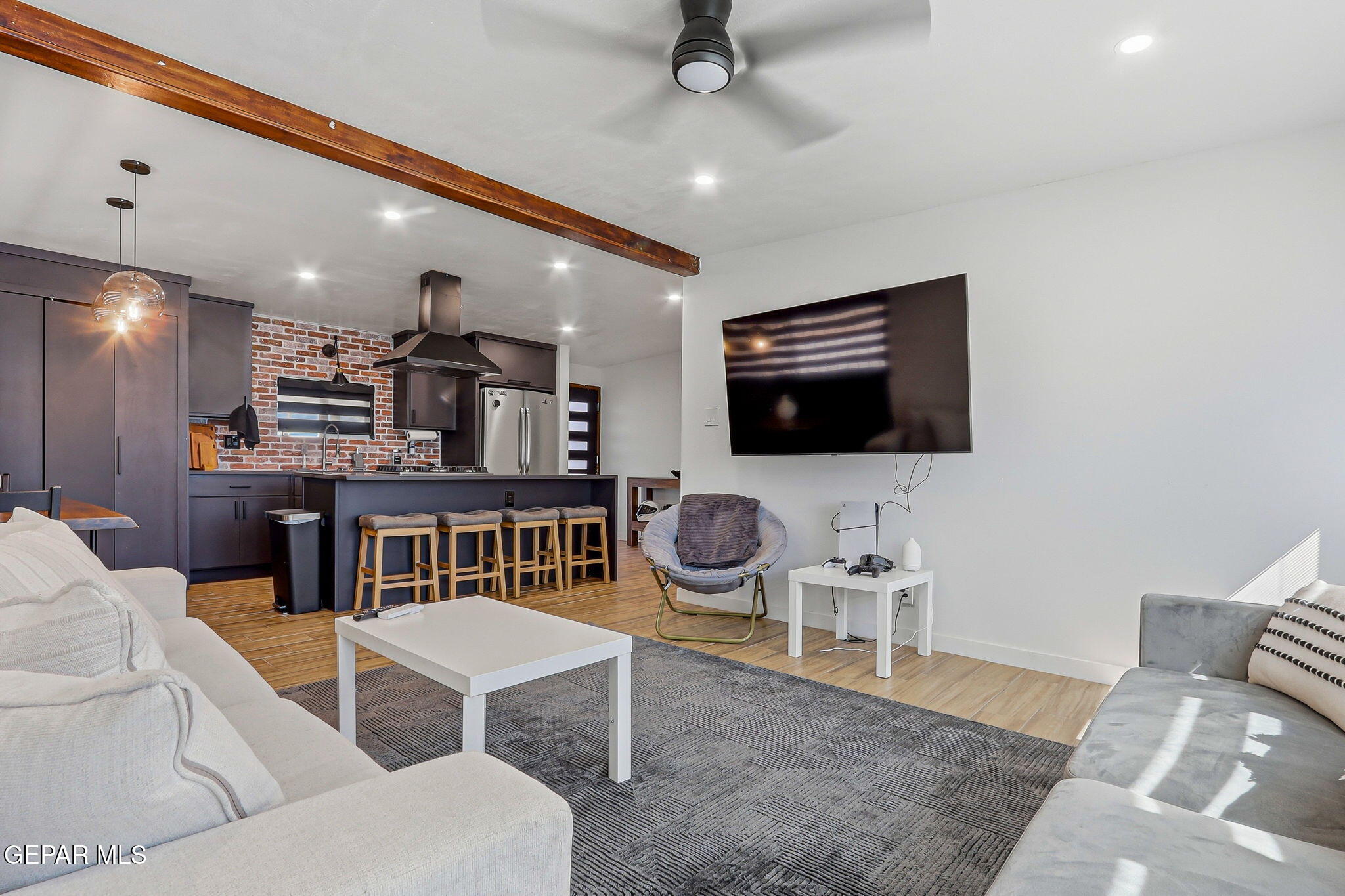 5240 Blue Ridge Drive El Paso, TX 79904 - Photo 18 of 37 a living room with furniture and a flat screen tv