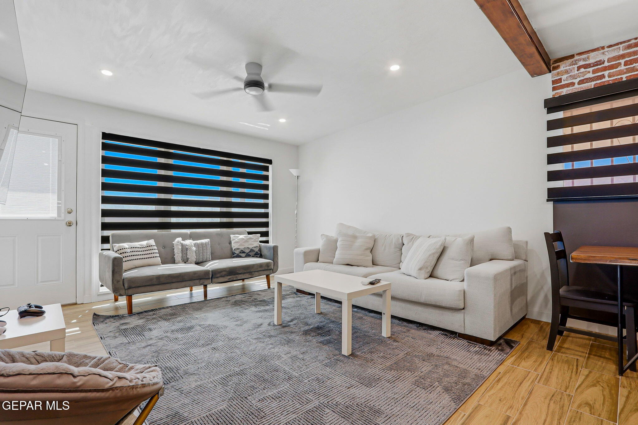 5240 Blue Ridge Drive El Paso, TX 79904 - Photo 20 of 37 a living room with furniture and a wooden floor