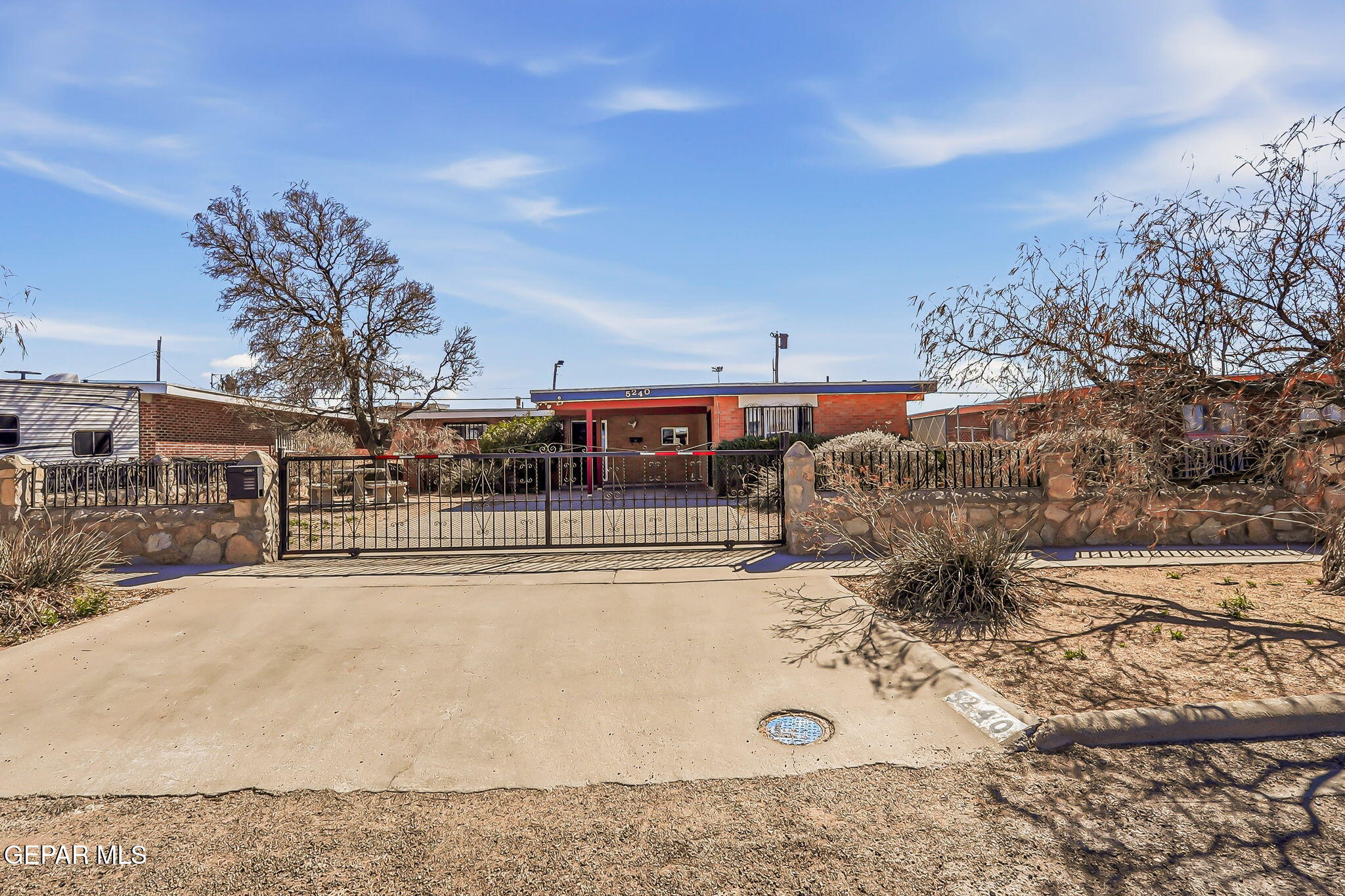 5240 Blue Ridge Drive El Paso, TX 79904 - Photo 2 of 37 a view of a swimming pool with a yard