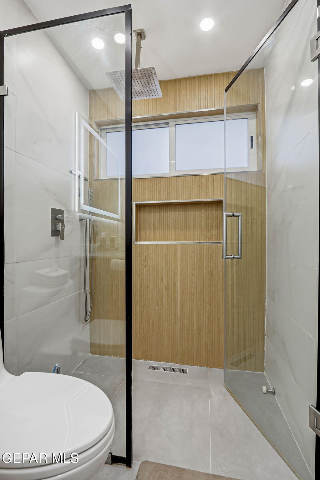 5240 Blue Ridge Drive El Paso, TX 79904 - Photo 29 of 37 a bathroom with a toilet and a shower
