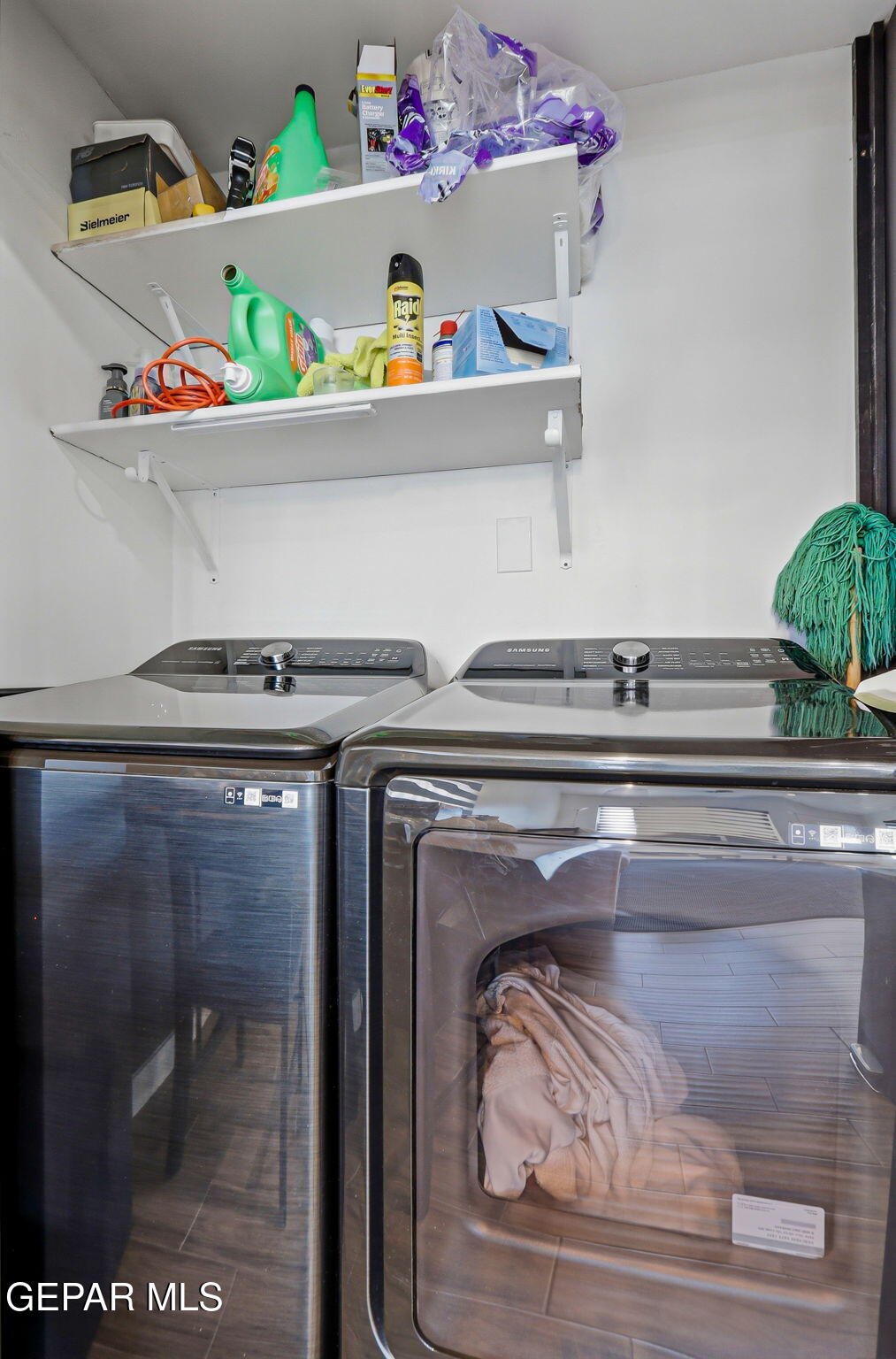 5240 Blue Ridge Drive El Paso, TX 79904 - Photo 35 of 37 a utility room with a wooden floor