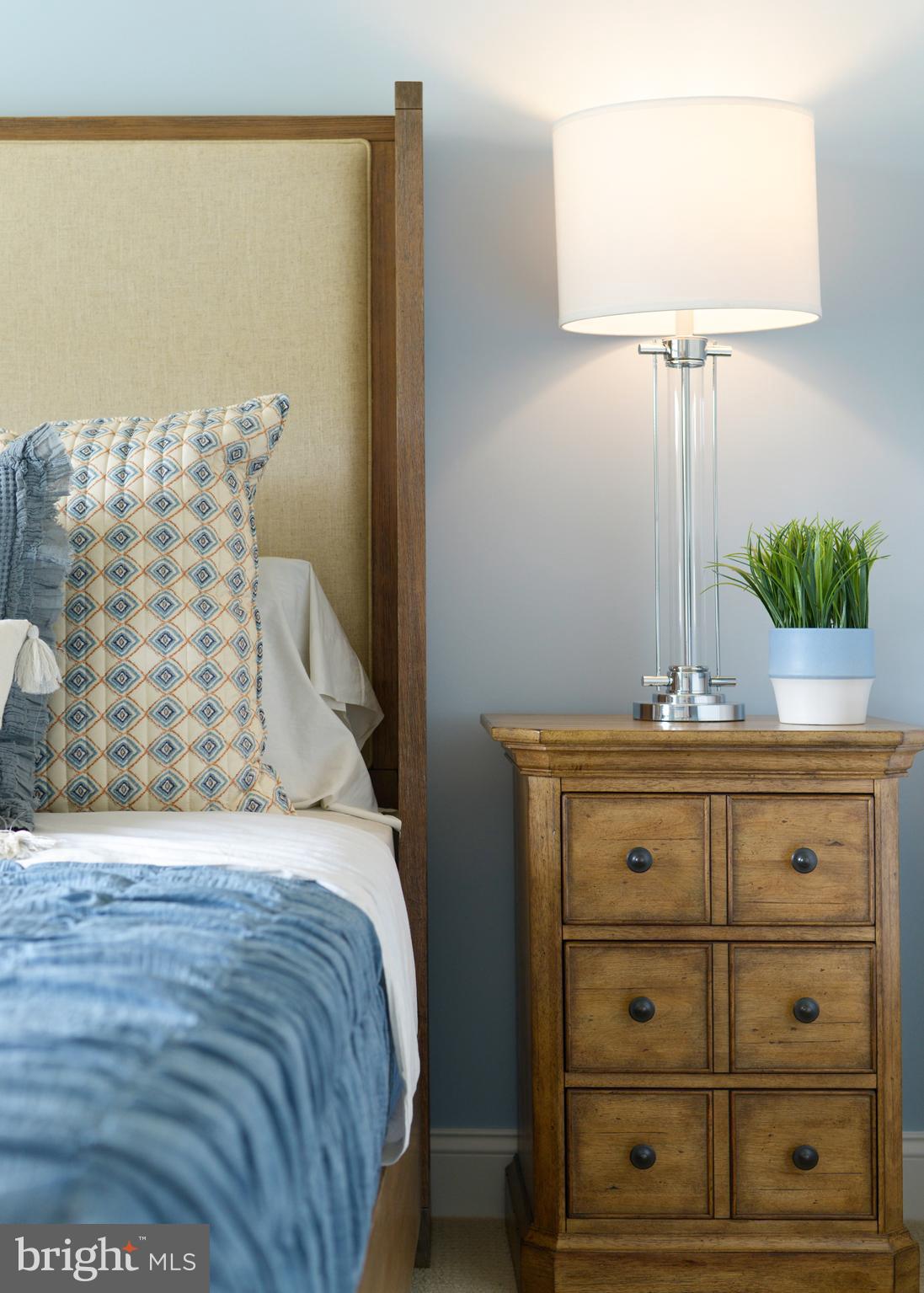 21802 Eastbridge Loop Lewes, DE 19958 - Photo 33 of 34 a bathroom with a sink and a mirror