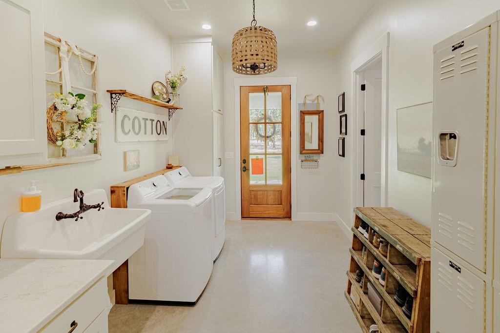 2094 Jim Harry Loop Sunset, TX 76270 - Photo 19 of 40 laundry room with ample cabinets, lockers and broom closet