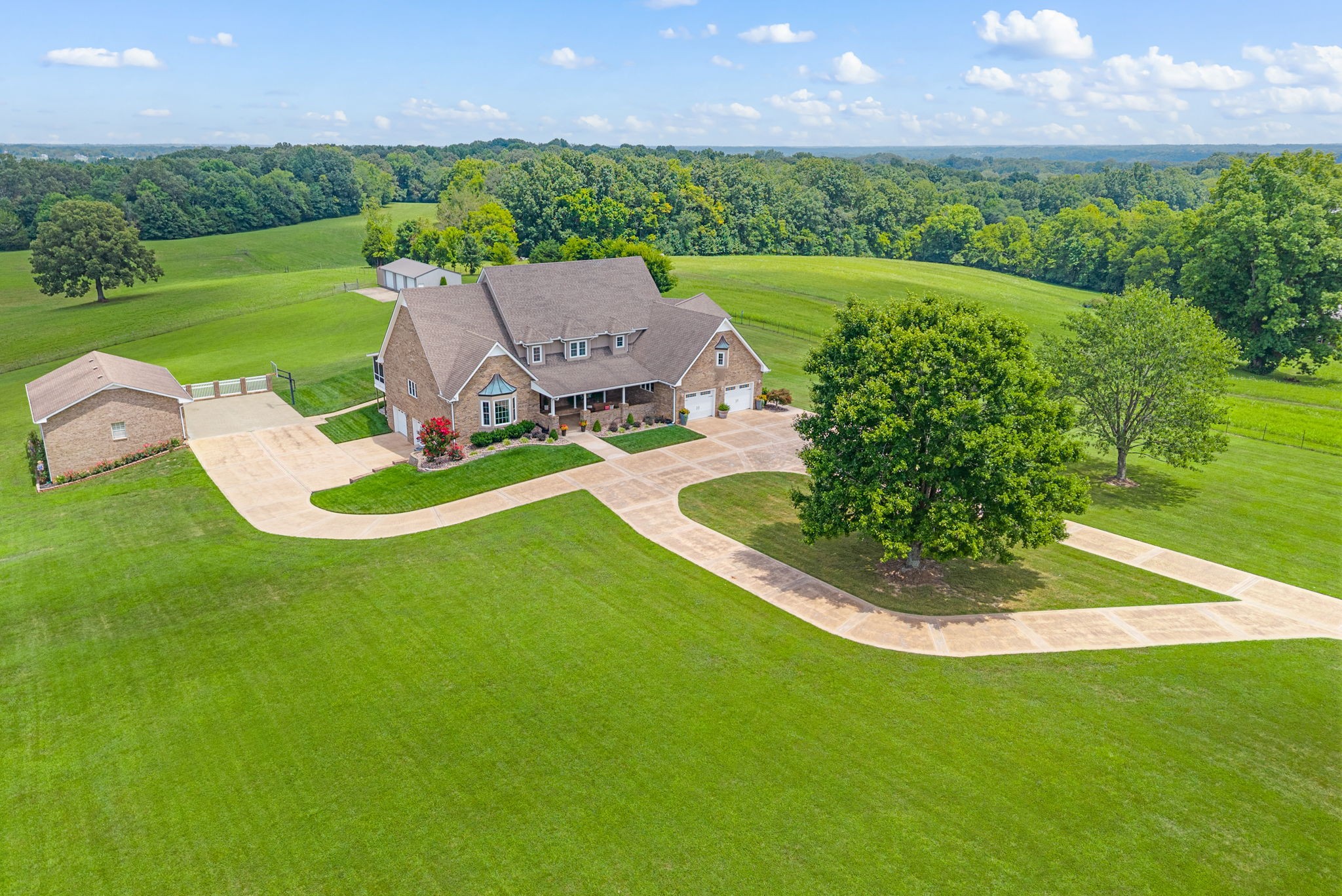 a view of a garden with an outdoor space and seating area