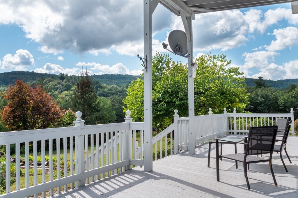 155 Worthington Road Huntington, MA 01050 - Photo 2 of 40 a view of a chair in a patio