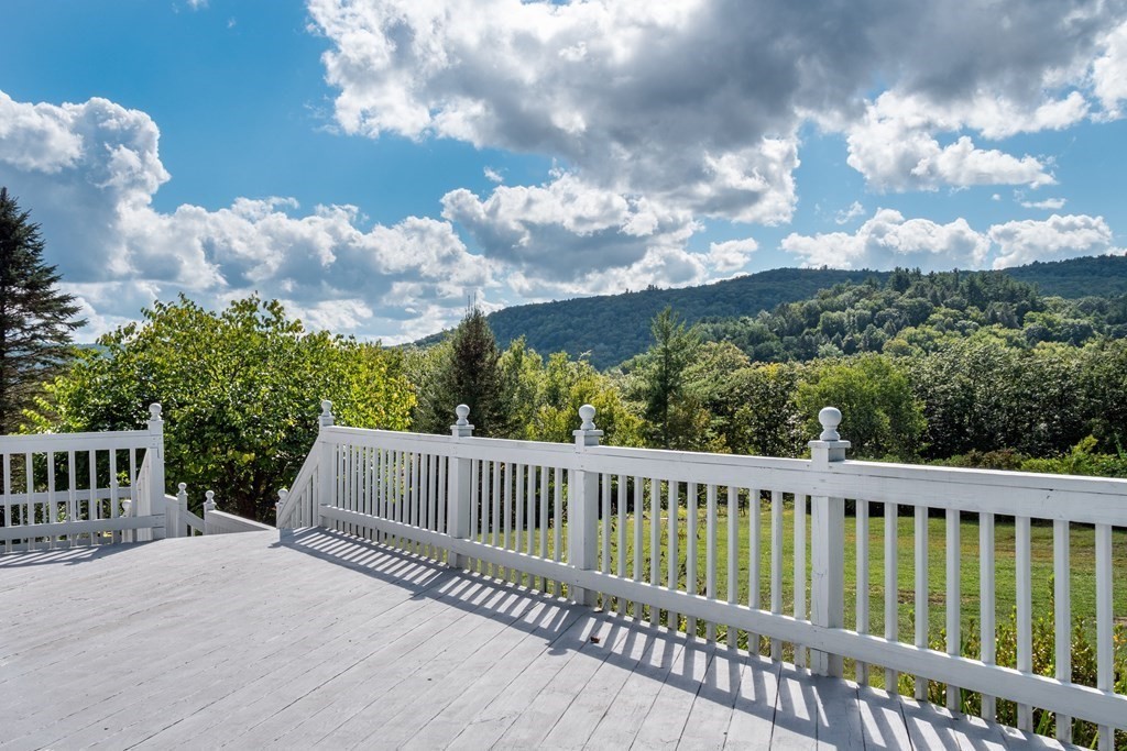 155 Worthington Road Huntington, MA 01050 - Photo 31 of 40 a view of a roof deck with wooden fence
