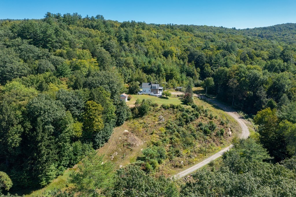 155 Worthington Road Huntington, MA 01050 - Photo 36 of 40 an aerial view of a house with a yard