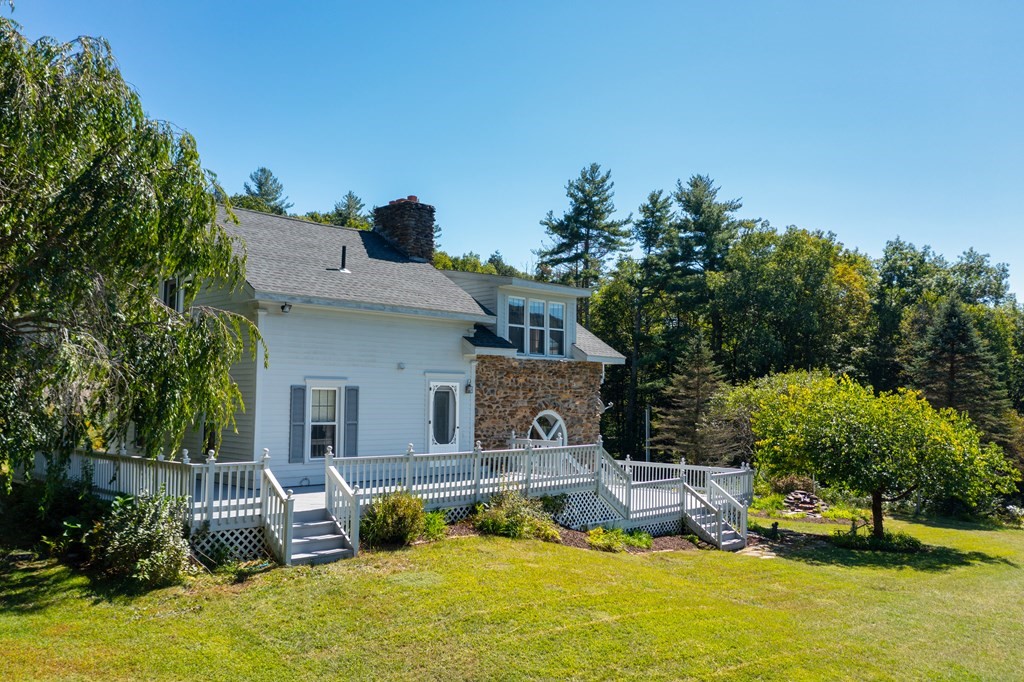 155 Worthington Road Huntington, MA 01050 - Photo 39 of 40 a view of a house with swimming pool and sitting area