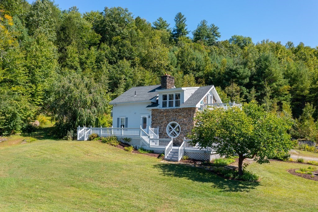 155 Worthington Road Huntington, MA 01050 - Photo 6 of 40 a house view with a garden space