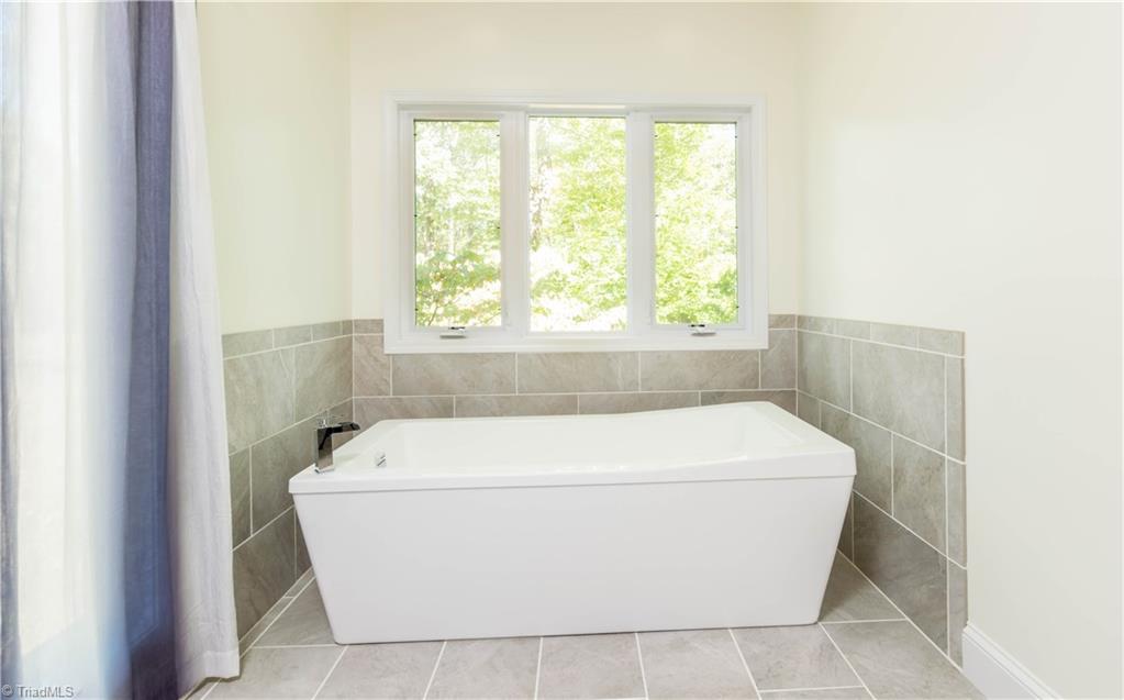 2012 River Road Stoneville, NC 27048 - Photo 17 of 30 Relax in this cozy modern oasis in your master bath.