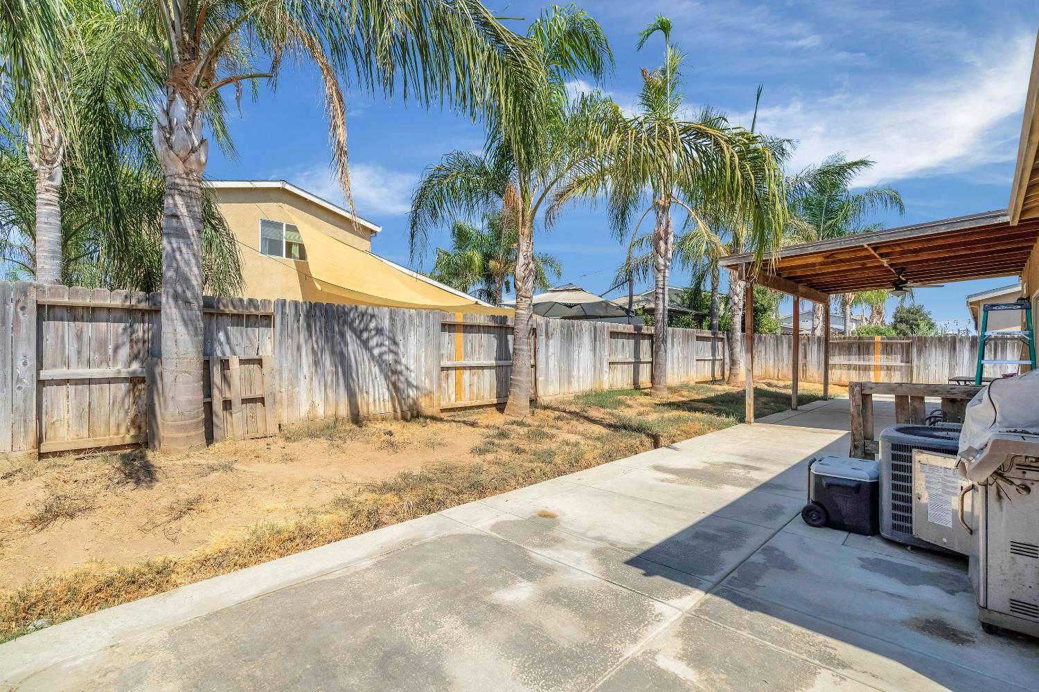 1981 Dunbar Way Dinuba, CA 93618 - Photo 12 of 12 a view of a backyard with sitting area