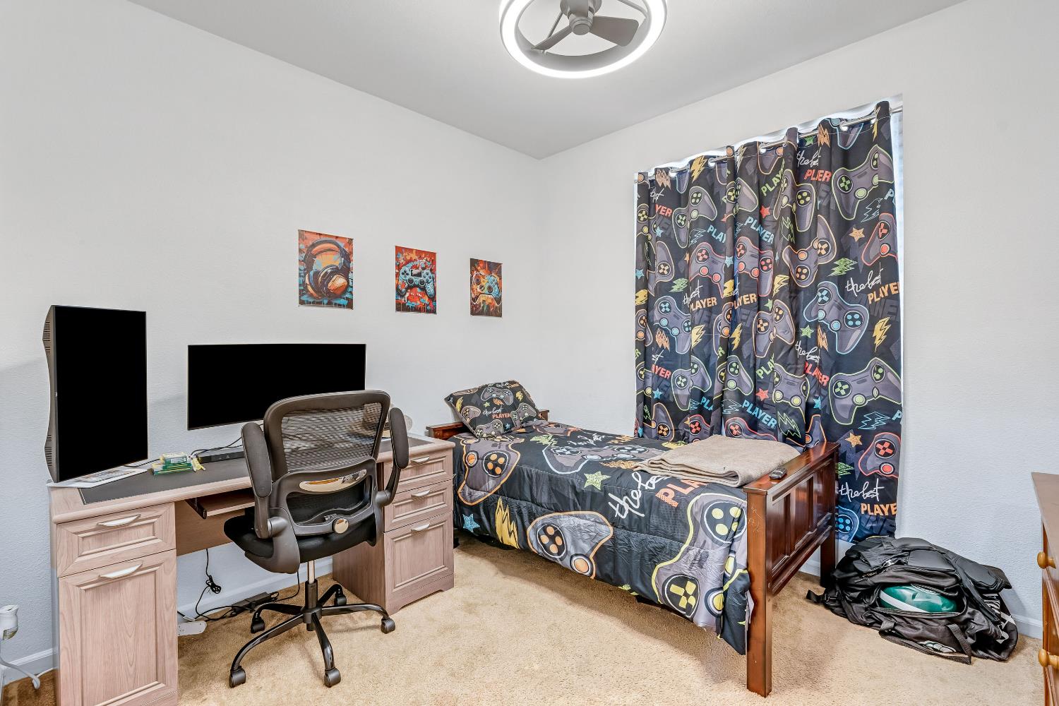 1981 Dunbar Way Dinuba, CA 93618 - Photo 7 of 12 a bedroom with a bed and a chair