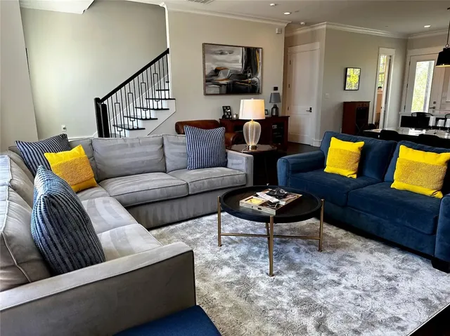a living room with furniture and a couch