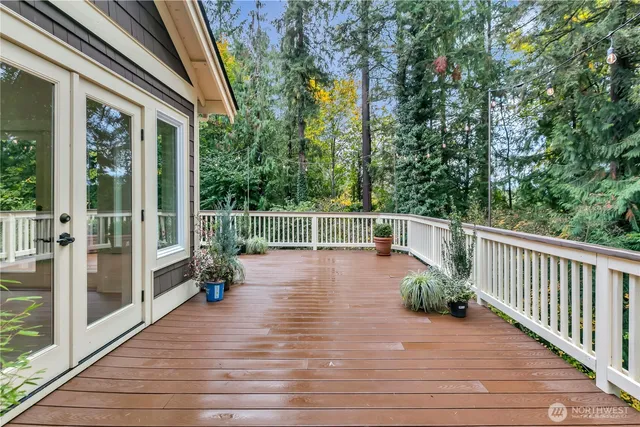 a view of a balcony with wooden floor