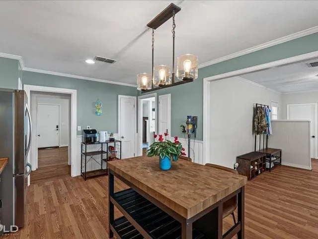 a view of a dining room and livingroom
