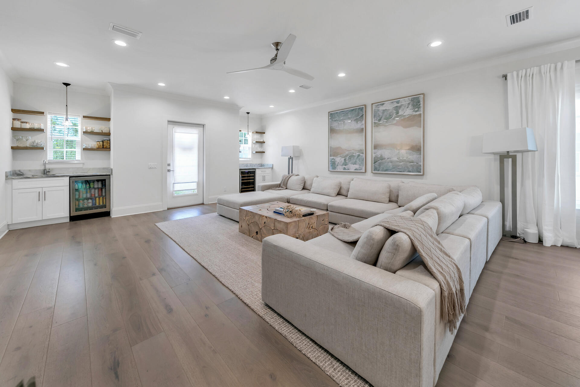 106 Heron's Crossing Santa Rosa Beach, FL 32459 - Photo 11 of 65 a living room with furniture and a wooden floor