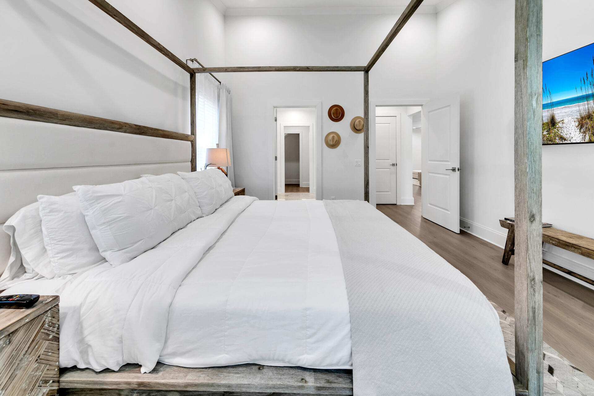 106 Heron's Crossing Santa Rosa Beach, FL 32459 - Photo 22 of 65 a bedroom with a bed and a mirror