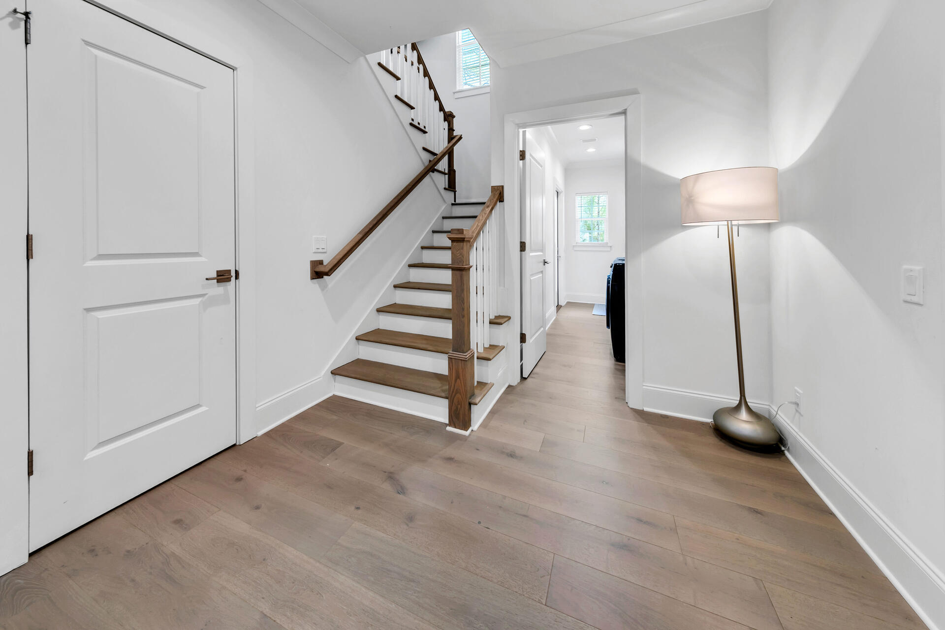 106 Heron's Crossing Santa Rosa Beach, FL 32459 - Photo 25 of 65 a view of a room with entryway wooden floor and front door