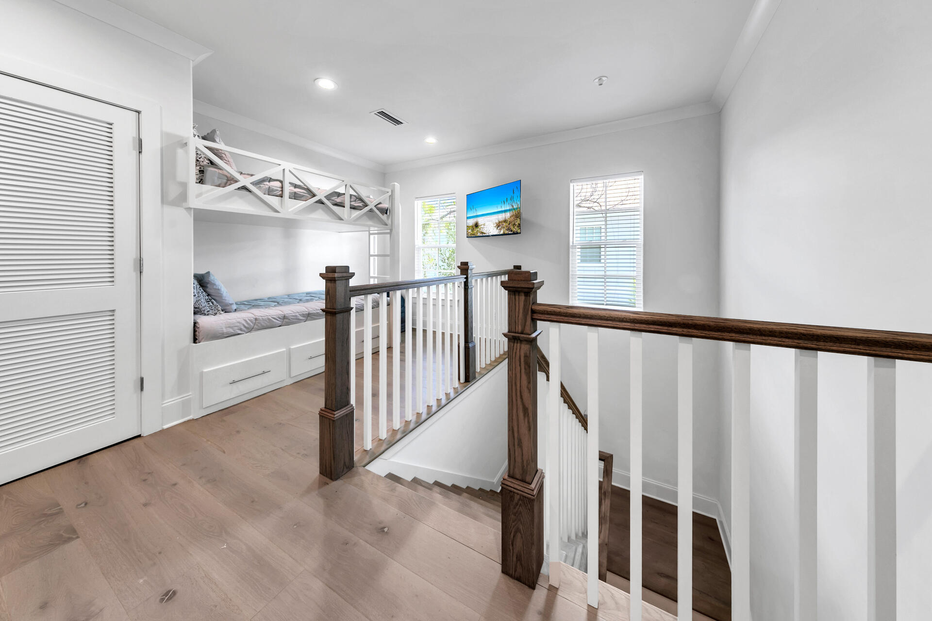 106 Heron's Crossing Santa Rosa Beach, FL 32459 - Photo 29 of 65 a view of a hallway with staircase