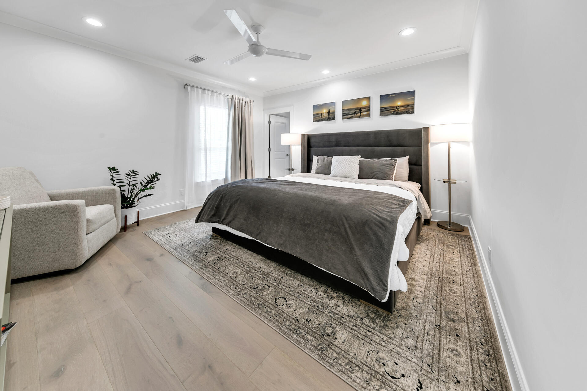 106 Heron's Crossing Santa Rosa Beach, FL 32459 - Photo 32 of 65 a spacious bedroom with a bed and a couch