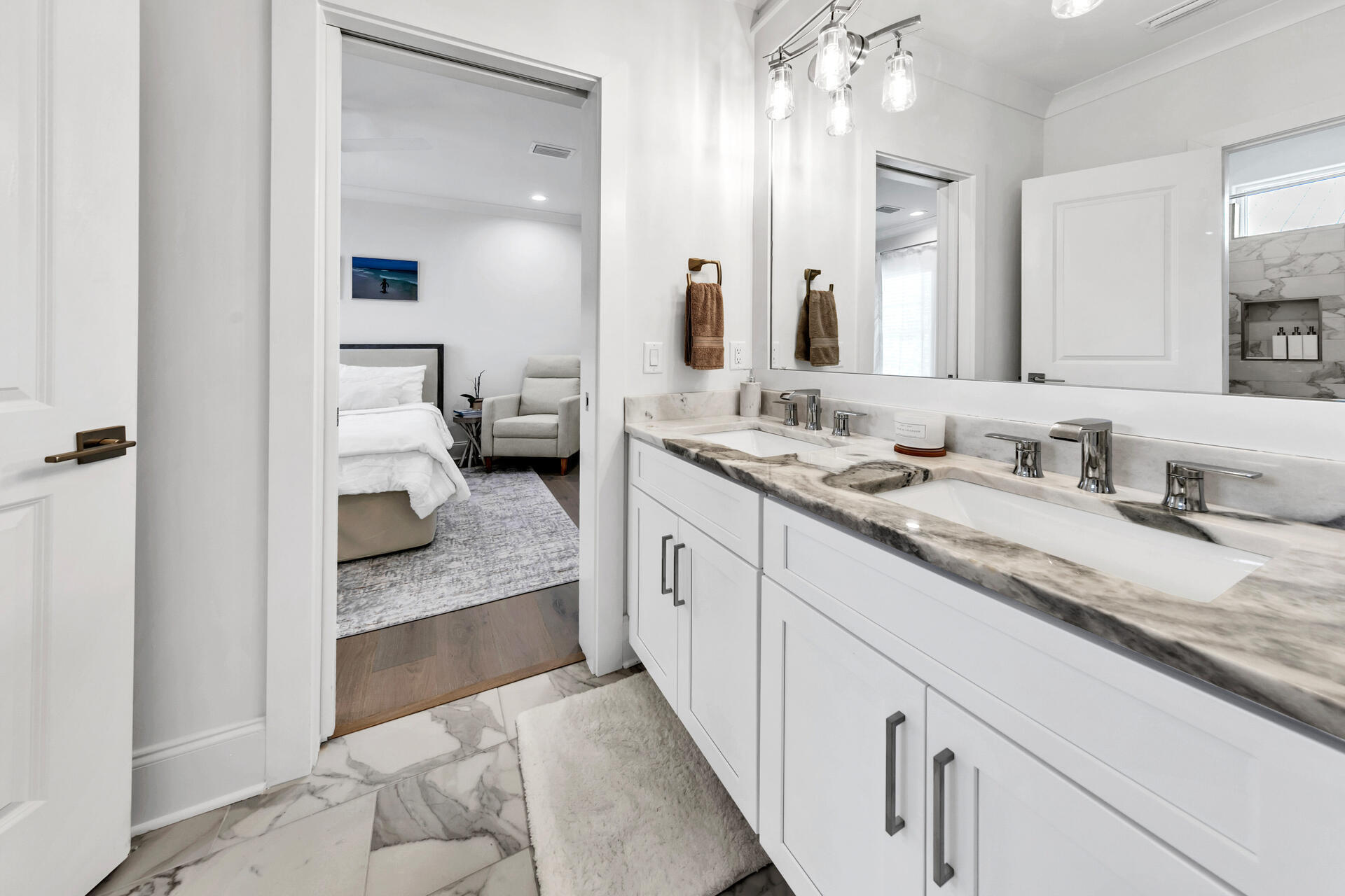 106 Heron's Crossing Santa Rosa Beach, FL 32459 - Photo 39 of 65 a en suite bathroom with a granite countertop double vanity sink mirror and