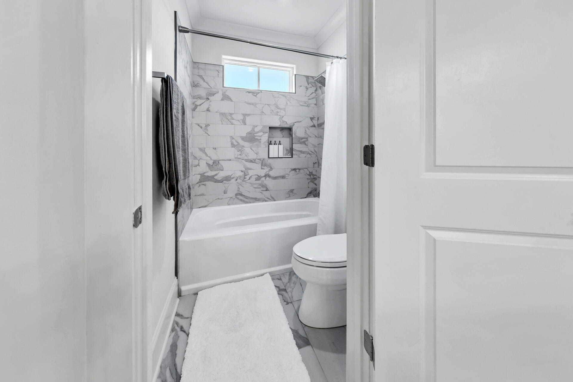 106 Heron's Crossing Santa Rosa Beach, FL 32459 - Photo 40 of 65 a bathroom with a toilet and shower