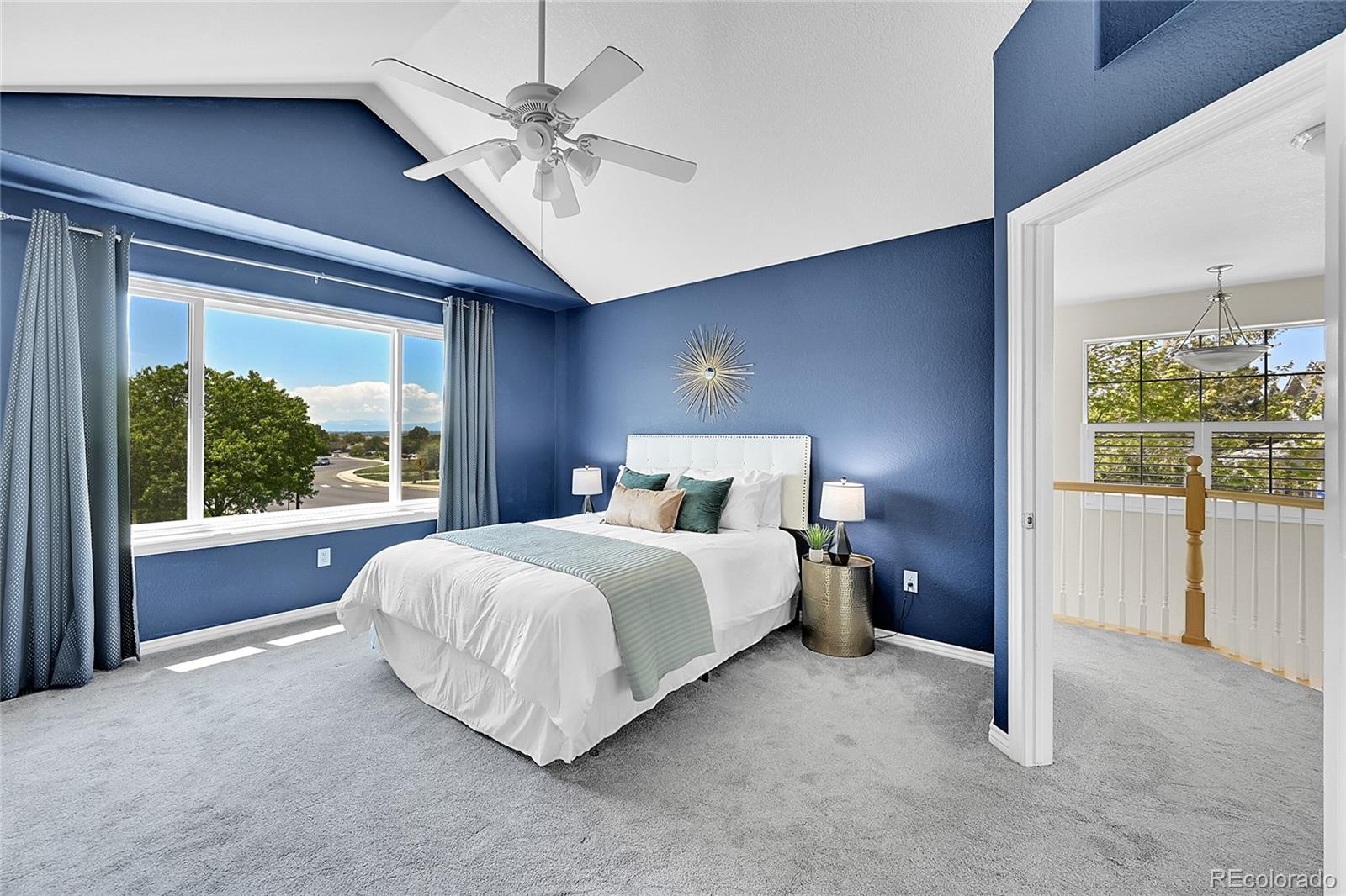 3406 Purcell Street Brighton, CO 80601 - Photo 20 of 50 a spacious bedroom with a bed and a large window