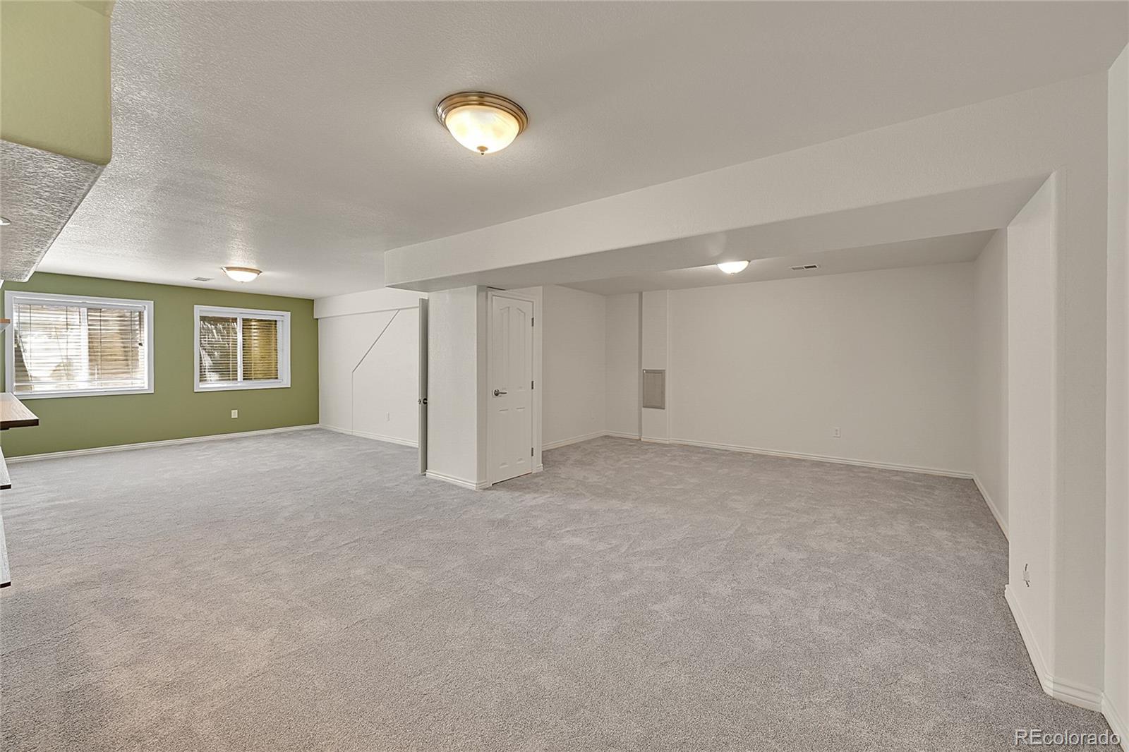 3406 Purcell Street Brighton, CO 80601 - Photo 36 of 50 a view of an empty room with a window