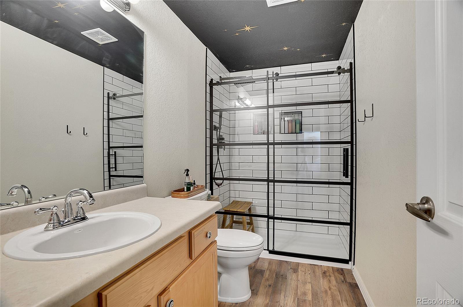 3406 Purcell Street Brighton, CO 80601 - Photo 38 of 50 a bathroom with a sink toilet and shower