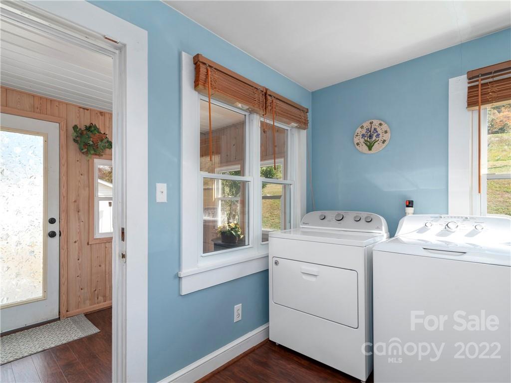 50 Farm House Road Canton, NC 28716 - Photo 14 of 29 a view of washer and dryer with bathroom in the background