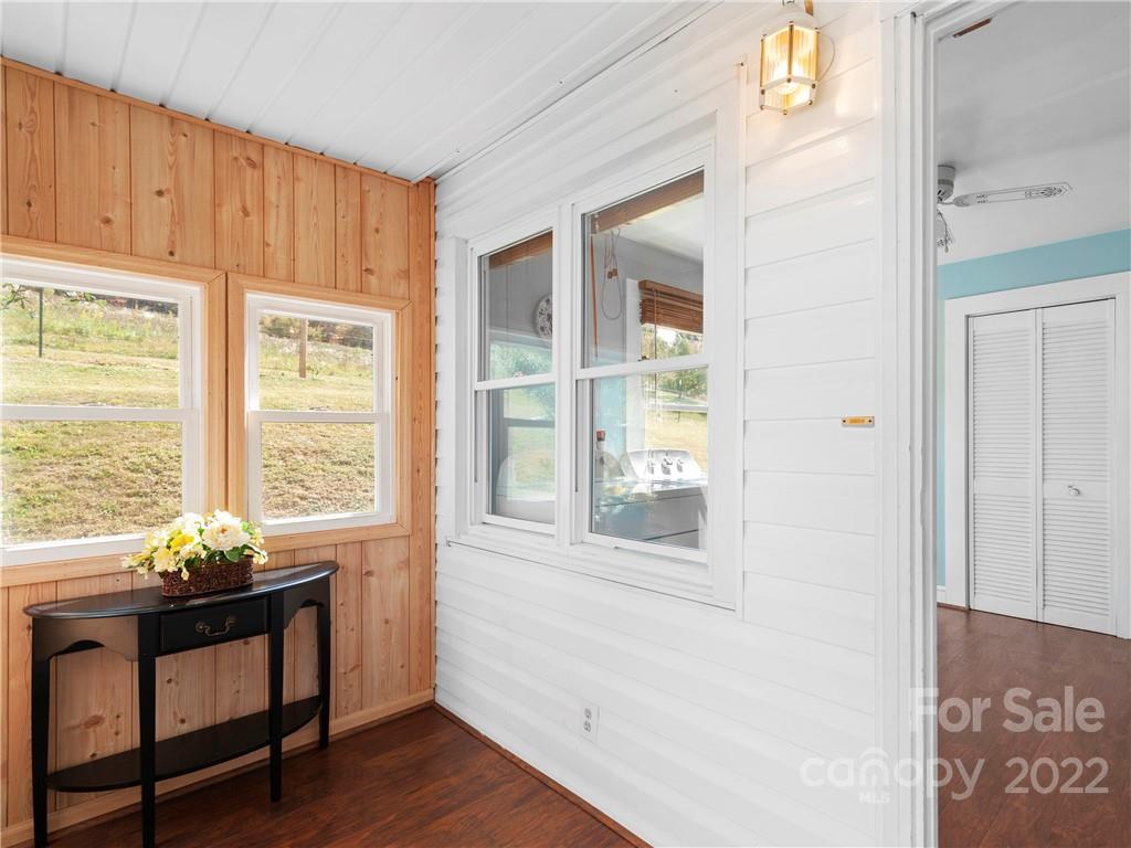 50 Farm House Road Canton, NC 28716 - Photo 15 of 29 a view of a room with wooden floor and furniture