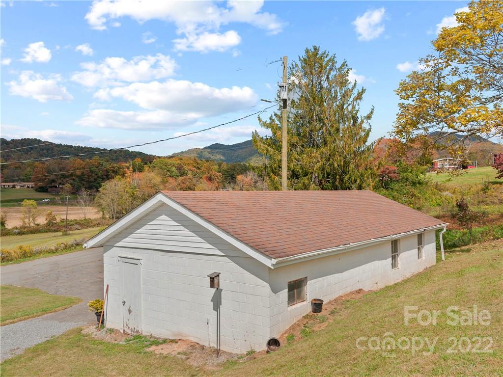 50 Farm House Road Canton, NC 28716 - Photo 26 of 29 a view of a house with a yard