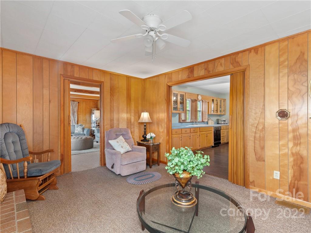 50 Farm House Road Canton, NC 28716 - Photo 10 of 29 a living room with furniture flowerpot and a chandelier