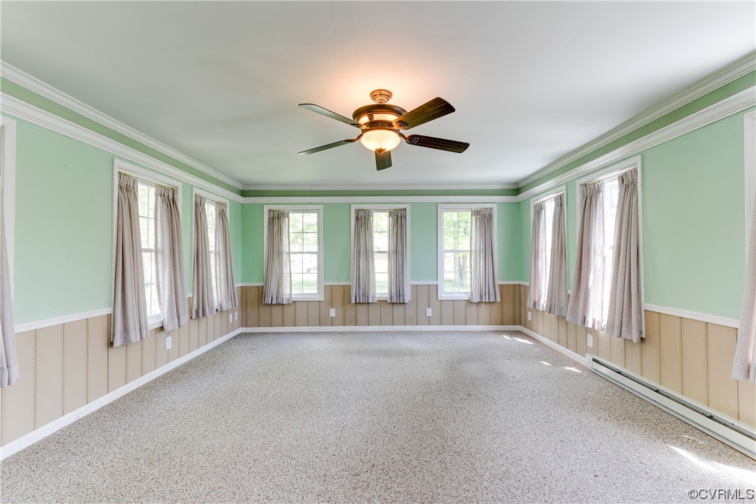 11606 Genito Road Midlothian, VA 23112 - Photo 21 of 48 a view of n empty room with window and a ceiling fan