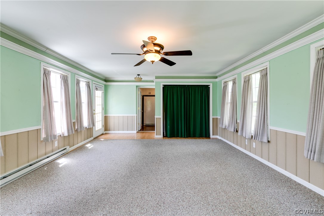 11606 Genito Road Midlothian, VA 23112 - Photo 23 of 48 a view of a livingroom with a ceiling fan and window