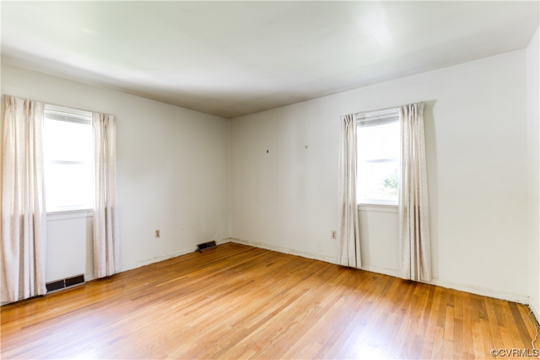 11606 Genito Road Midlothian, VA 23112 - Photo 35 of 48 an empty room with wooden floor