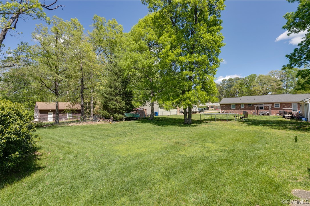 11606 Genito Road Midlothian, VA 23112 - Photo 44 of 48 a view of a house with a big yard