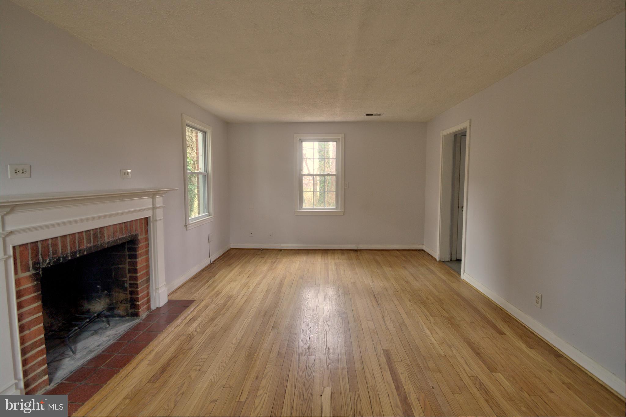 7031 Concord Road Pikesville, MD 21208 - Photo 4 of 51 Refinished hardwood!