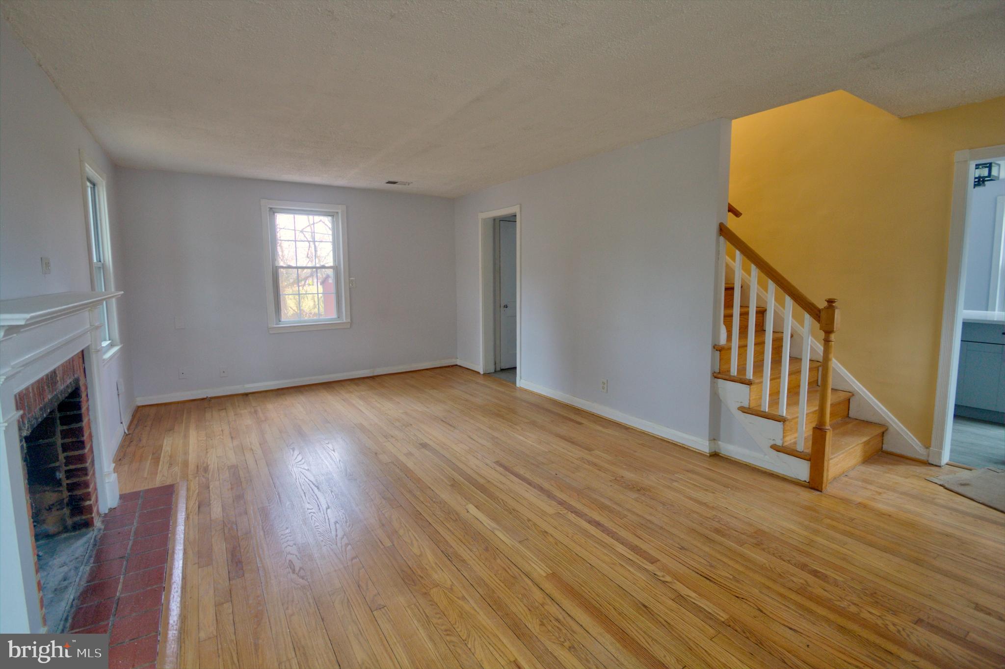 7031 Concord Road Pikesville, MD 21208 - Photo 6 of 51 Spacious living room w/hardwood floors.