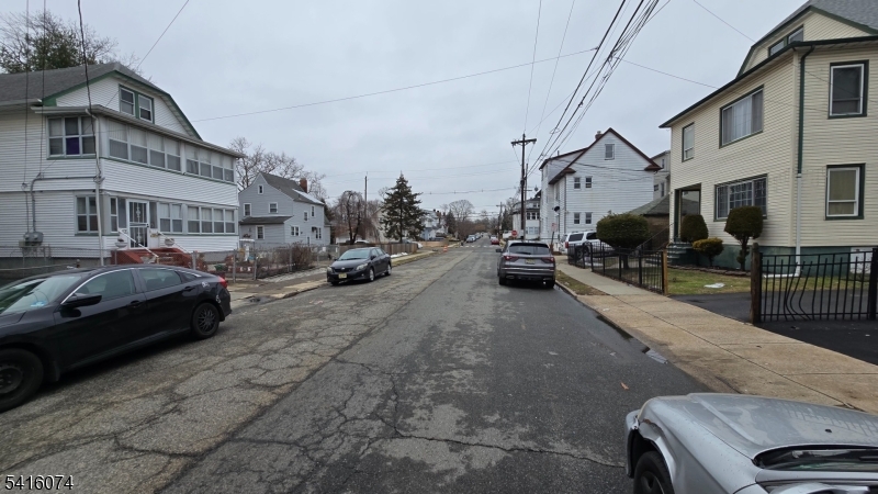 170 Spring Street Passaic, NJ 07055 - Photo 11 of 11 a view of a street with cars
